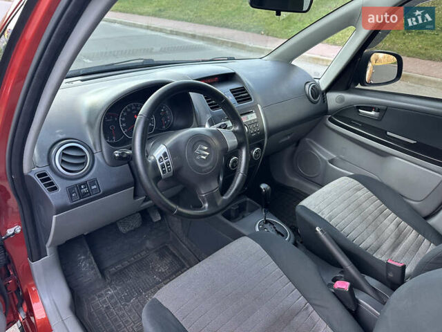 Помаранчевий Сузукі СХ4, об'ємом двигуна 1.6 л та пробігом 202 тис. км за 7200 $, фото 20 на Automoto.ua