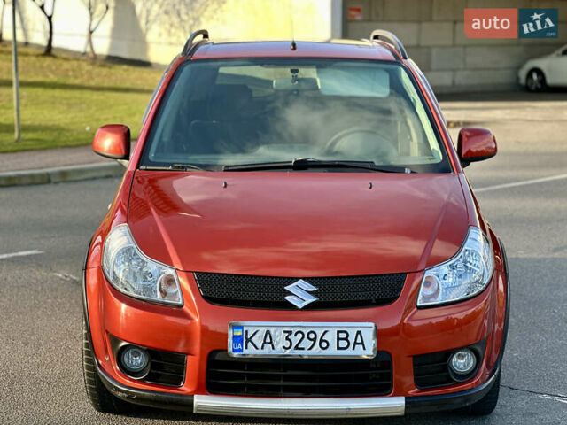 Помаранчевий Сузукі СХ4, об'ємом двигуна 1.6 л та пробігом 202 тис. км за 7200 $, фото 4 на Automoto.ua