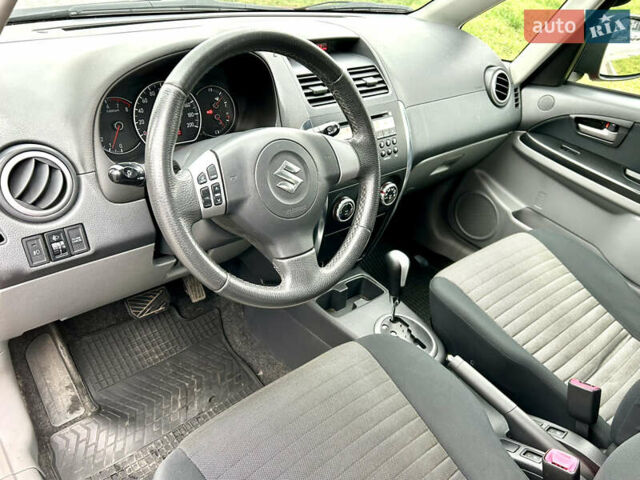 Помаранчевий Сузукі СХ4, об'ємом двигуна 1.6 л та пробігом 240 тис. км за 7500 $, фото 24 на Automoto.ua
