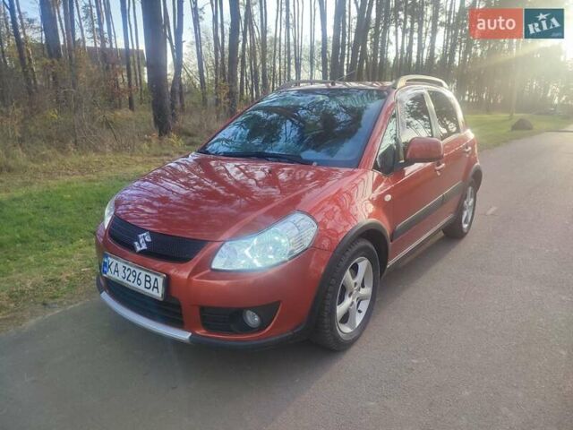 Оранжевый Сузуки СХ4, объемом двигателя 1.6 л и пробегом 202 тыс. км за 6100 $, фото 1 на Automoto.ua