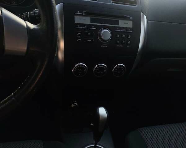 Оранжевый Сузуки СХ4, объемом двигателя 1.59 л и пробегом 172 тыс. км за 7600 $, фото 6 на Automoto.ua