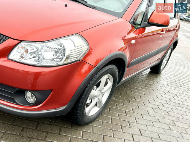 Помаранчевий Сузукі СХ4, об'ємом двигуна 1.6 л та пробігом 240 тис. км за 7500 $, фото 10 на Automoto.ua