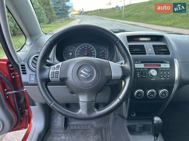 Помаранчевий Сузукі СХ4, об'ємом двигуна 1.6 л та пробігом 202 тис. км за 7200 $, фото 30 на Automoto.ua