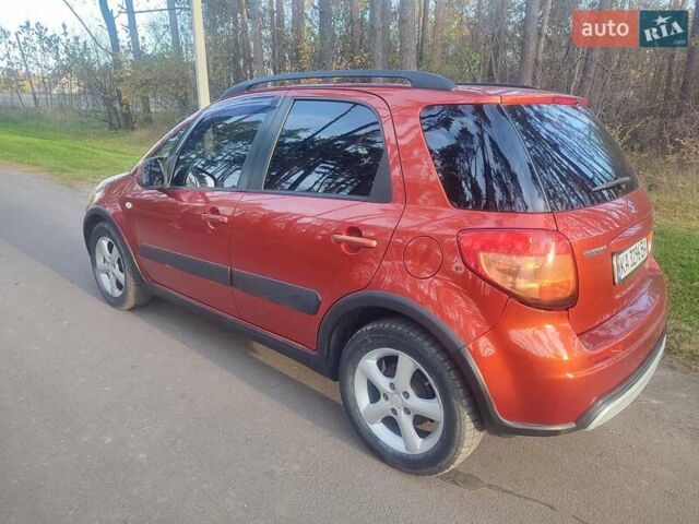 Оранжевый Сузуки СХ4, объемом двигателя 1.6 л и пробегом 202 тыс. км за 6100 $, фото 3 на Automoto.ua