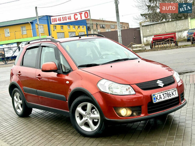 Помаранчевий Сузукі СХ4, об'ємом двигуна 1.6 л та пробігом 240 тис. км за 7500 $, фото 42 на Automoto.ua