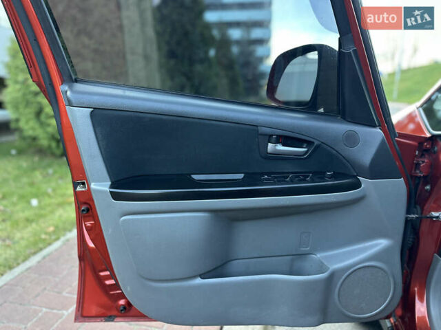 Помаранчевий Сузукі СХ4, об'ємом двигуна 1.6 л та пробігом 202 тис. км за 7200 $, фото 23 на Automoto.ua