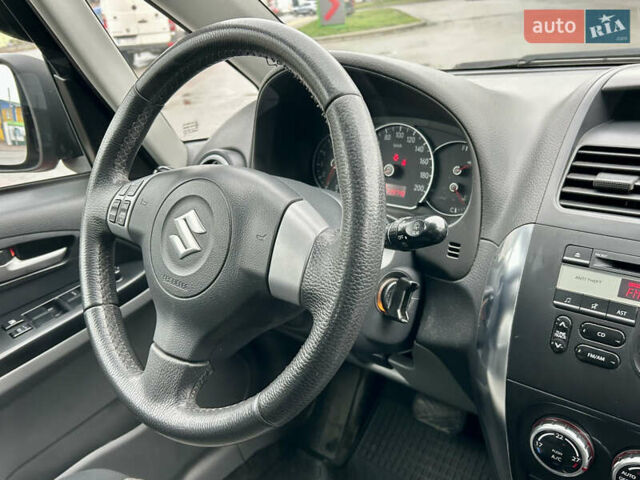 Помаранчевий Сузукі СХ4, об'ємом двигуна 1.6 л та пробігом 240 тис. км за 7500 $, фото 36 на Automoto.ua