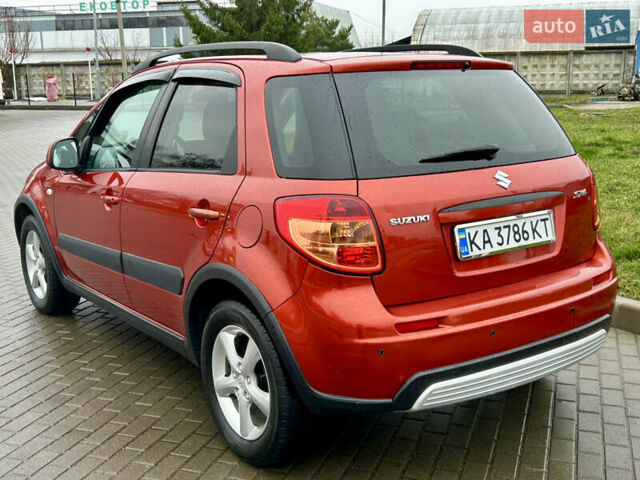 Помаранчевий Сузукі СХ4, об'ємом двигуна 1.6 л та пробігом 240 тис. км за 7500 $, фото 6 на Automoto.ua