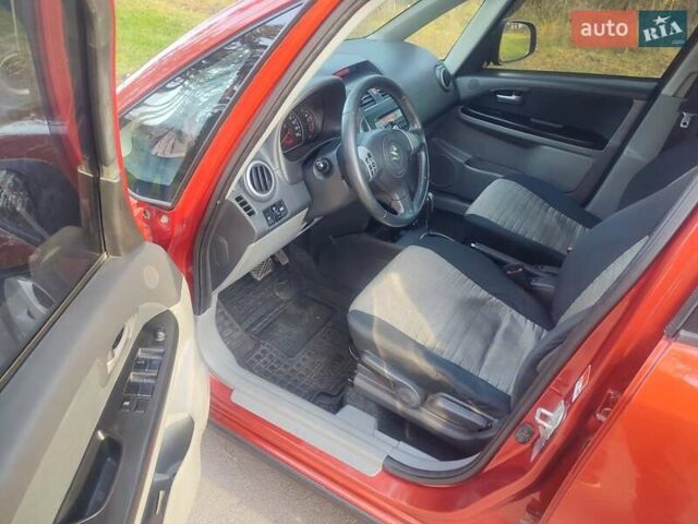 Оранжевый Сузуки СХ4, объемом двигателя 1.6 л и пробегом 202 тыс. км за 6100 $, фото 9 на Automoto.ua