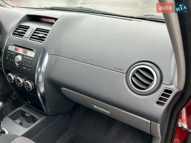 Помаранчевий Сузукі СХ4, об'ємом двигуна 1.6 л та пробігом 240 тис. км за 7500 $, фото 37 на Automoto.ua