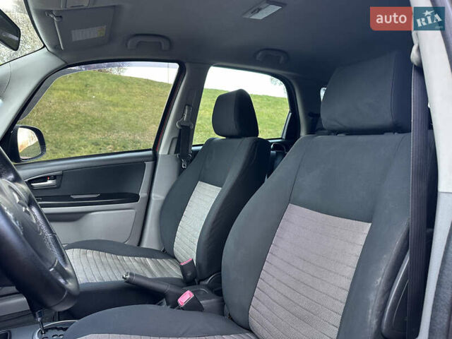 Помаранчевий Сузукі СХ4, об'ємом двигуна 1.6 л та пробігом 202 тис. км за 7200 $, фото 21 на Automoto.ua