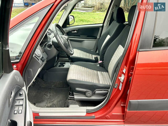 Помаранчевий Сузукі СХ4, об'ємом двигуна 1.6 л та пробігом 240 тис. км за 7500 $, фото 22 на Automoto.ua