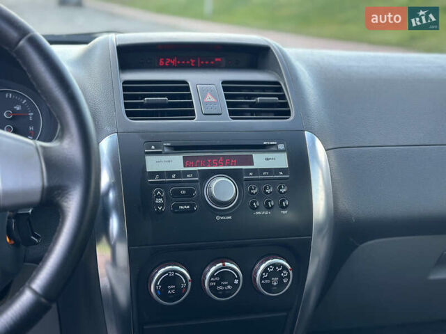 Помаранчевий Сузукі СХ4, об'ємом двигуна 1.6 л та пробігом 202 тис. км за 7200 $, фото 27 на Automoto.ua