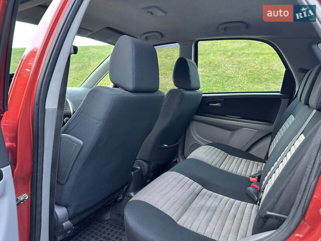 Помаранчевий Сузукі СХ4, об'ємом двигуна 1.6 л та пробігом 202 тис. км за 7200 $, фото 31 на Automoto.ua