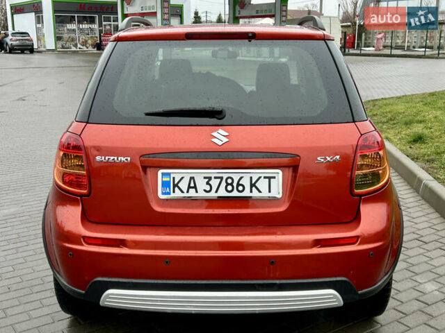 Помаранчевий Сузукі СХ4, об'ємом двигуна 1.6 л та пробігом 240 тис. км за 7500 $, фото 5 на Automoto.ua