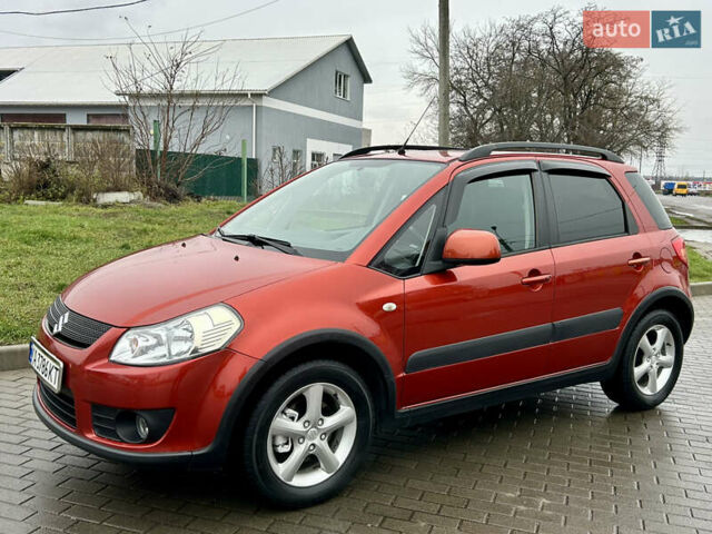 Помаранчевий Сузукі СХ4, об'ємом двигуна 1.6 л та пробігом 240 тис. км за 7500 $, фото 9 на Automoto.ua