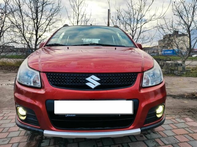 Оранжевый Сузуки СХ4, объемом двигателя 1.6 л и пробегом 92 тыс. км за 7000 $, фото 2 на Automoto.ua