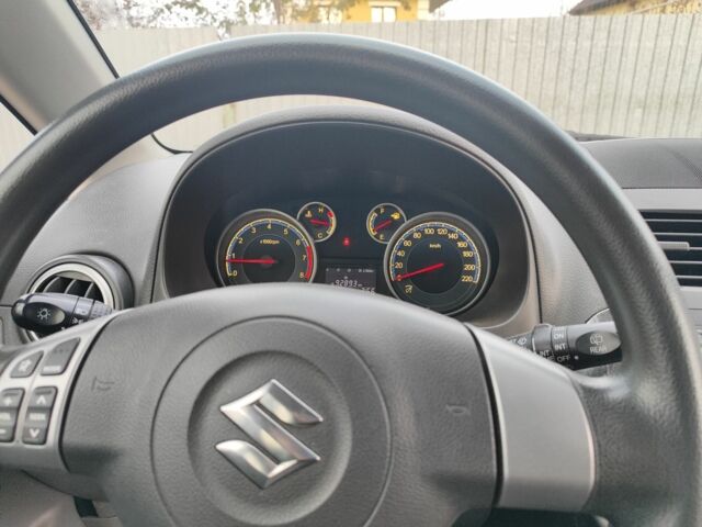 Оранжевый Сузуки СХ4, объемом двигателя 1.6 л и пробегом 92 тыс. км за 7000 $, фото 3 на Automoto.ua