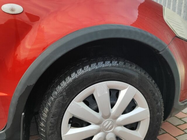 Оранжевый Сузуки СХ4, объемом двигателя 1.6 л и пробегом 92 тыс. км за 7000 $, фото 1 на Automoto.ua