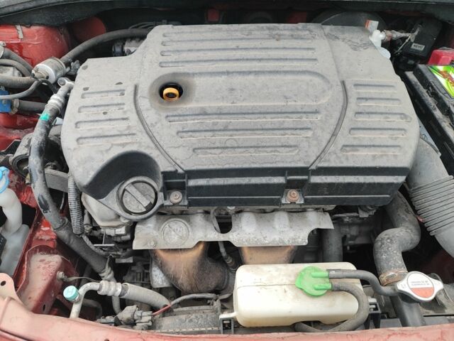 Оранжевый Сузуки СХ4, объемом двигателя 1.6 л и пробегом 92 тыс. км за 7000 $, фото 5 на Automoto.ua