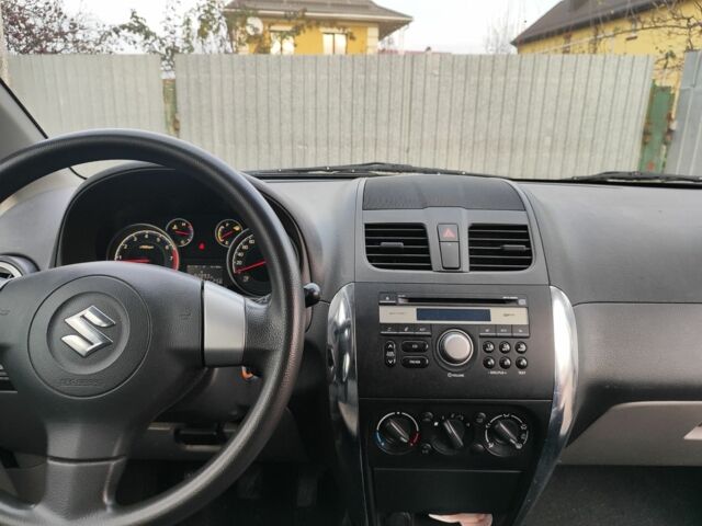 Оранжевый Сузуки СХ4, объемом двигателя 1.6 л и пробегом 92 тыс. км за 7000 $, фото 4 на Automoto.ua