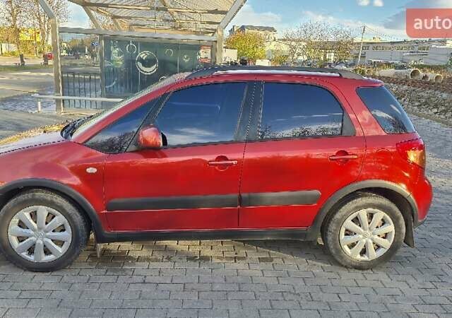 Помаранчевий Сузукі СХ4, об'ємом двигуна 1.6 л та пробігом 68 тис. км за 9000 $, фото 3 на Automoto.ua