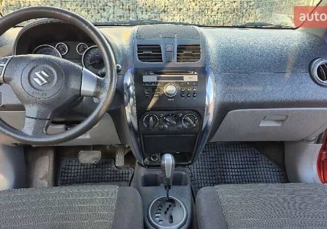 Помаранчевий Сузукі СХ4, об'ємом двигуна 1.6 л та пробігом 68 тис. км за 9000 $, фото 11 на Automoto.ua