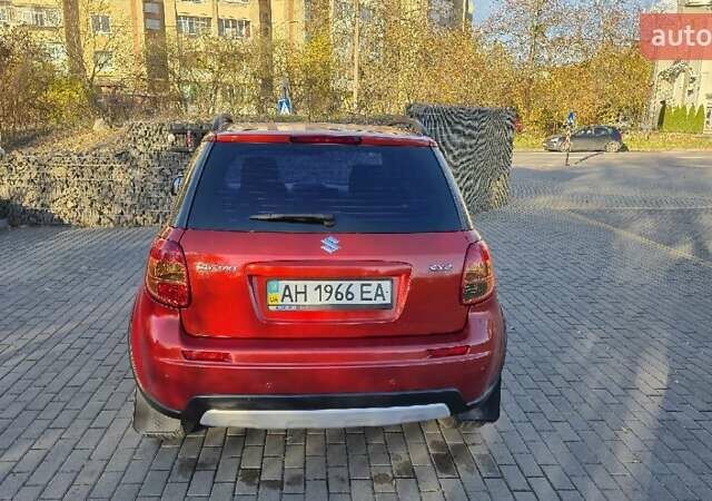 Помаранчевий Сузукі СХ4, об'ємом двигуна 1.6 л та пробігом 68 тис. км за 9000 $, фото 2 на Automoto.ua