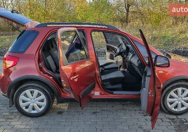 Помаранчевий Сузукі СХ4, об'ємом двигуна 1.6 л та пробігом 68 тис. км за 9000 $, фото 9 на Automoto.ua