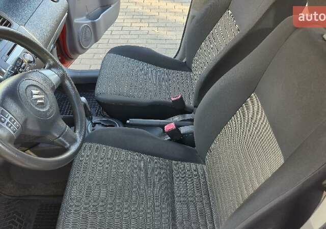 Помаранчевий Сузукі СХ4, об'ємом двигуна 1.6 л та пробігом 68 тис. км за 9000 $, фото 8 на Automoto.ua