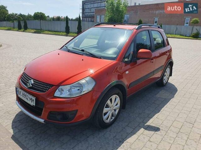 Помаранчевий Сузукі СХ4, об'ємом двигуна 1.59 л та пробігом 226 тис. км за 8000 $, фото 3 на Automoto.ua