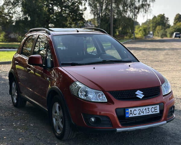 Помаранчевий Сузукі СХ4, об'ємом двигуна 1.59 л та пробігом 204 тис. км за 6799 $, фото 2 на Automoto.ua