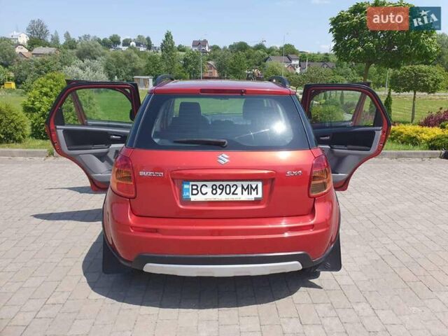 Помаранчевий Сузукі СХ4, об'ємом двигуна 1.59 л та пробігом 226 тис. км за 8000 $, фото 6 на Automoto.ua