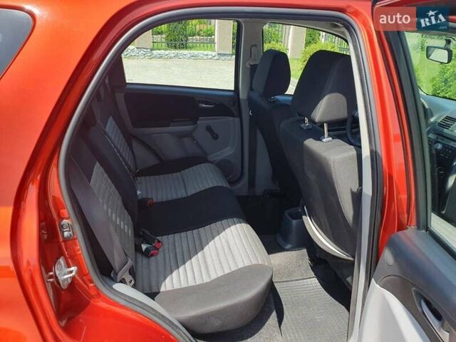 Помаранчевий Сузукі СХ4, об'ємом двигуна 1.59 л та пробігом 226 тис. км за 8000 $, фото 12 на Automoto.ua