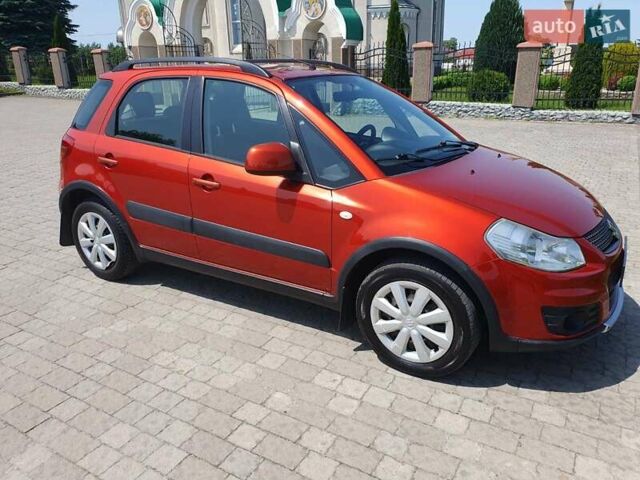 Помаранчевий Сузукі СХ4, об'ємом двигуна 1.59 л та пробігом 226 тис. км за 8000 $, фото 1 на Automoto.ua