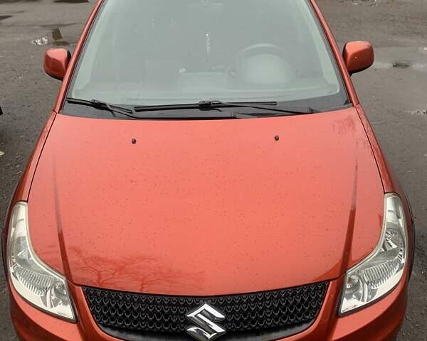 Оранжевый Сузуки СХ4, объемом двигателя 1.59 л и пробегом 105 тыс. км за 9200 $, фото 5 на Automoto.ua