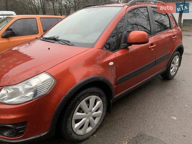 Оранжевый Сузуки СХ4, объемом двигателя 1.59 л и пробегом 105 тыс. км за 9200 $, фото 4 на Automoto.ua