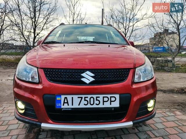 Оранжевый Сузуки СХ4, объемом двигателя 1.59 л и пробегом 92 тыс. км за 7000 $, фото 2 на Automoto.ua