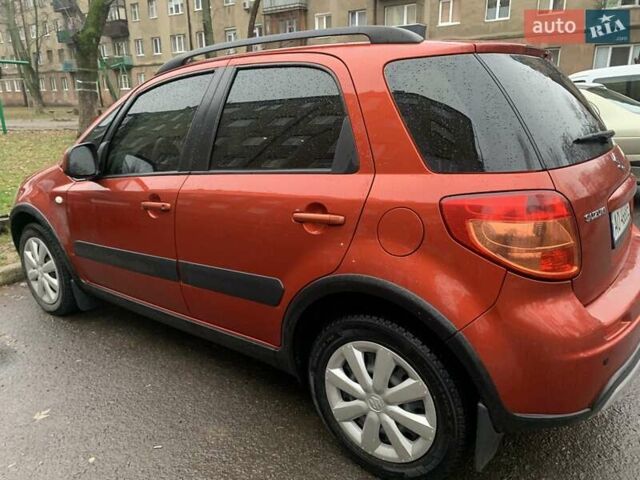 Оранжевый Сузуки СХ4, объемом двигателя 1.59 л и пробегом 105 тыс. км за 9200 $, фото 7 на Automoto.ua