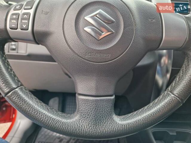 Помаранчевий Сузукі СХ4, об'ємом двигуна 1.6 л та пробігом 88 тис. км за 11200 $, фото 72 на Automoto.ua