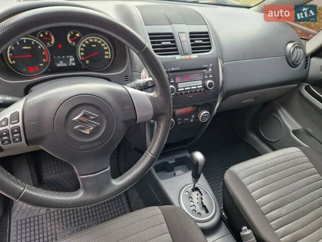 Помаранчевий Сузукі СХ4, об'ємом двигуна 1.6 л та пробігом 88 тис. км за 11200 $, фото 55 на Automoto.ua