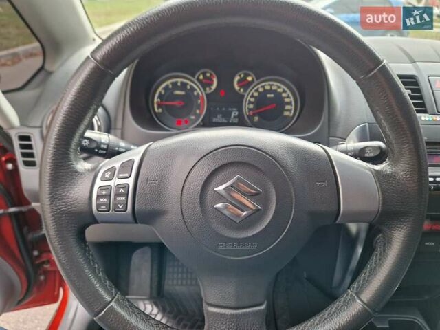 Помаранчевий Сузукі СХ4, об'ємом двигуна 1.6 л та пробігом 88 тис. км за 11200 $, фото 71 на Automoto.ua