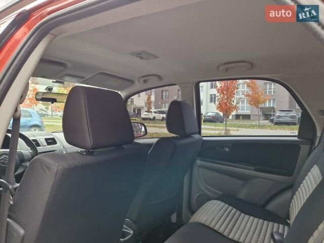 Помаранчевий Сузукі СХ4, об'ємом двигуна 1.6 л та пробігом 88 тис. км за 11200 $, фото 48 на Automoto.ua