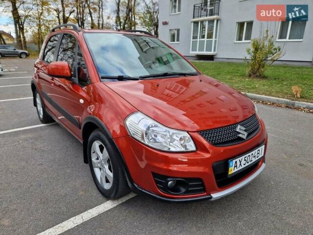 Помаранчевий Сузукі СХ4, об'ємом двигуна 1.6 л та пробігом 88 тис. км за 11200 $, фото 30 на Automoto.ua