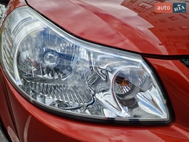 Помаранчевий Сузукі СХ4, об'ємом двигуна 1.6 л та пробігом 88 тис. км за 11200 $, фото 32 на Automoto.ua