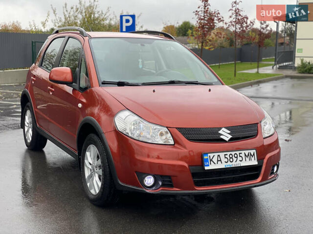Сузуки СХ4 2012 в Буче на Automoto.ua Оранжевый Сузуки СХ4, объемом двигателя 2 л и пробегом 180 тыс. км за 8700 $, фото 5 на Automoto.ua