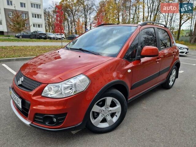 Помаранчевий Сузукі СХ4, об'ємом двигуна 1.6 л та пробігом 88 тис. км за 11200 $, фото 5 на Automoto.ua