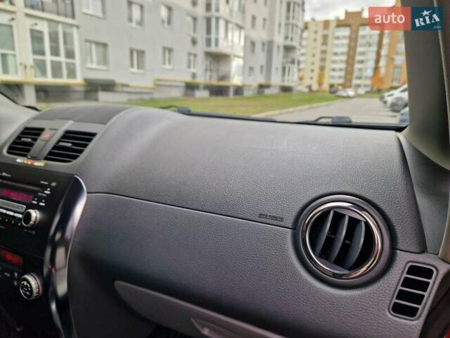 Помаранчевий Сузукі СХ4, об'ємом двигуна 1.6 л та пробігом 88 тис. км за 11200 $, фото 41 на Automoto.ua