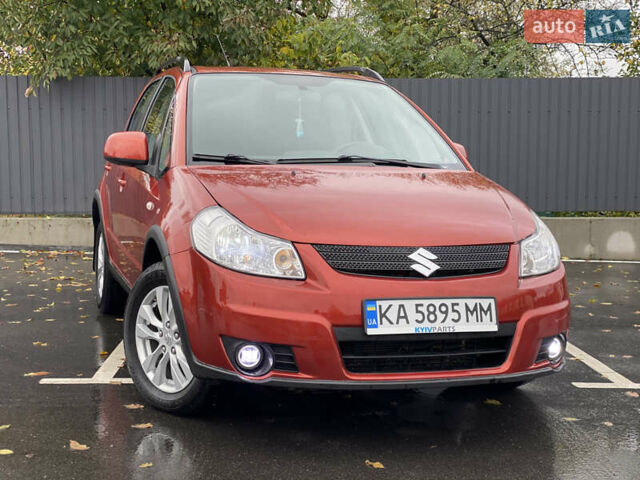 Сузуки СХ4 2012 в Буче на Automoto.ua Оранжевый Сузуки СХ4, объемом двигателя 2 л и пробегом 180 тыс. км за 8700 $, фото 1 на Automoto.ua
