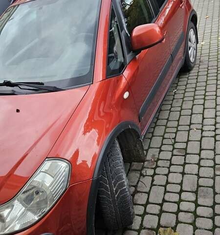 Сузуки СХ4 2012 в Львове на Automoto.ua Оранжевый Сузуки СХ4, объемом двигателя 1.6 л и пробегом 143 тыс. км за 8500 $, фото 2 на Automoto.ua
